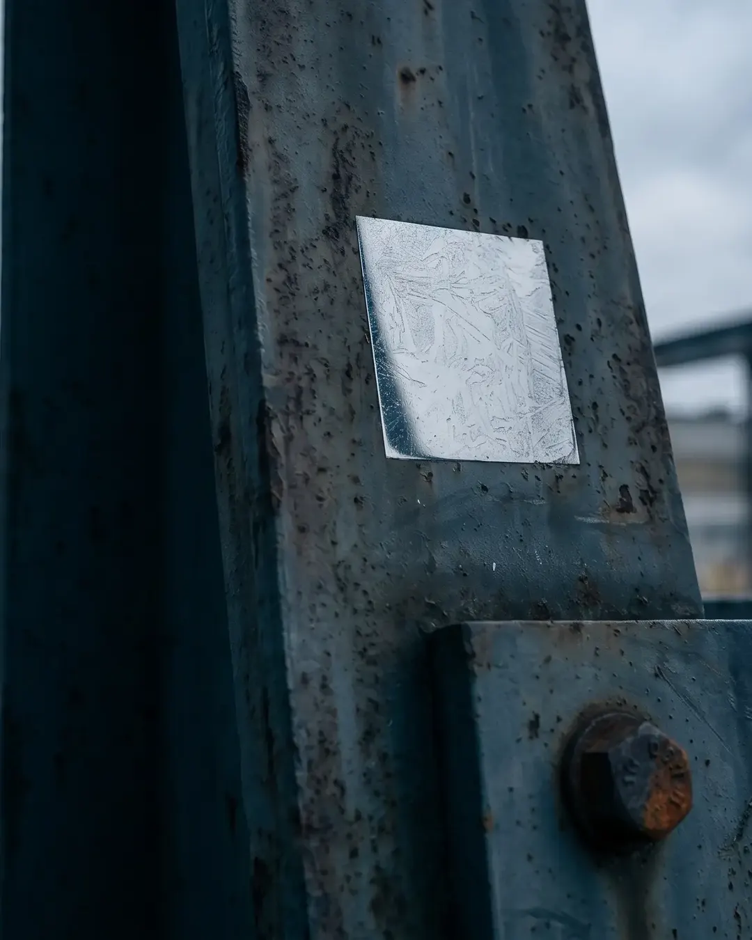A small mirror-polished and etched window worked into a large steel component