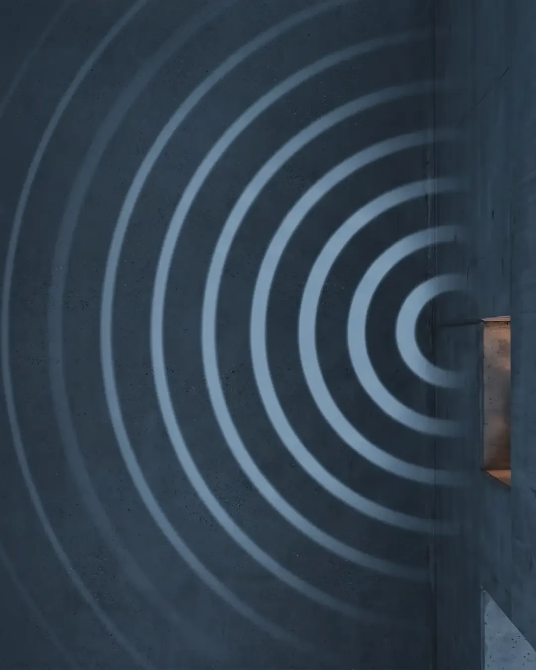 Concentric wave arcs propagating through a dark concrete-like medium