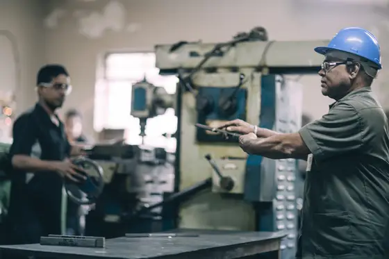 The TCR Engineering machine shop floor at Mahape, Navi Mumbai, with lathes and milling machines in line