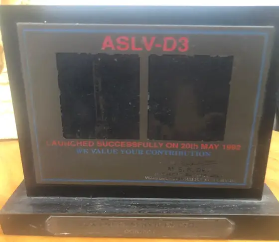 The ISRO memento presented to TCR Engineering for ASLV-D3: a black plate engraved ASLV-D3 above two launch photographs, LAUNCHED SUCCESSFULLY ON 20th MAY 1992 and WE VALUE YOUR CONTRIBUTION, signed by the Project Director, ASLV, Vikram Sarabhai Space Centre, on a plinth plated TCR ENGG. SERVICES LTD., BOMBAY