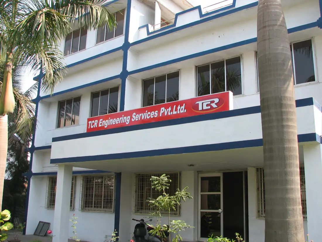 The front elevation of the TCR Engineering laboratory at Mahape, Navi Mumbai, with the company signage across the first floor