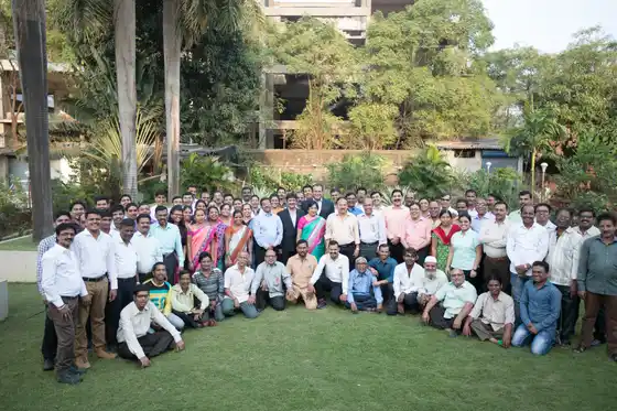 The TCR Engineering team assembled outside the Mahape laboratory for a full-company photograph