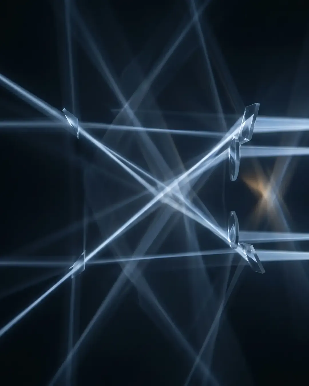 An abstract of coherent light passing through a precision optical train against black