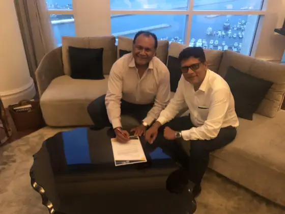 The signing of the joint-venture agreement that established TCR Qatar, Doha