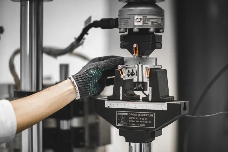 Fatigue testing on a servo-hydraulic frame.
